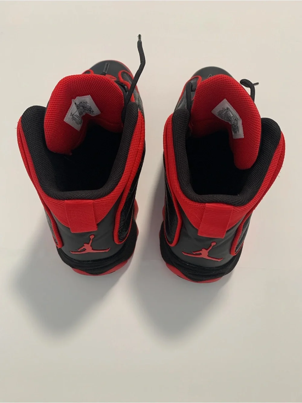 Jordan High-Top Sneakers in Black and Red